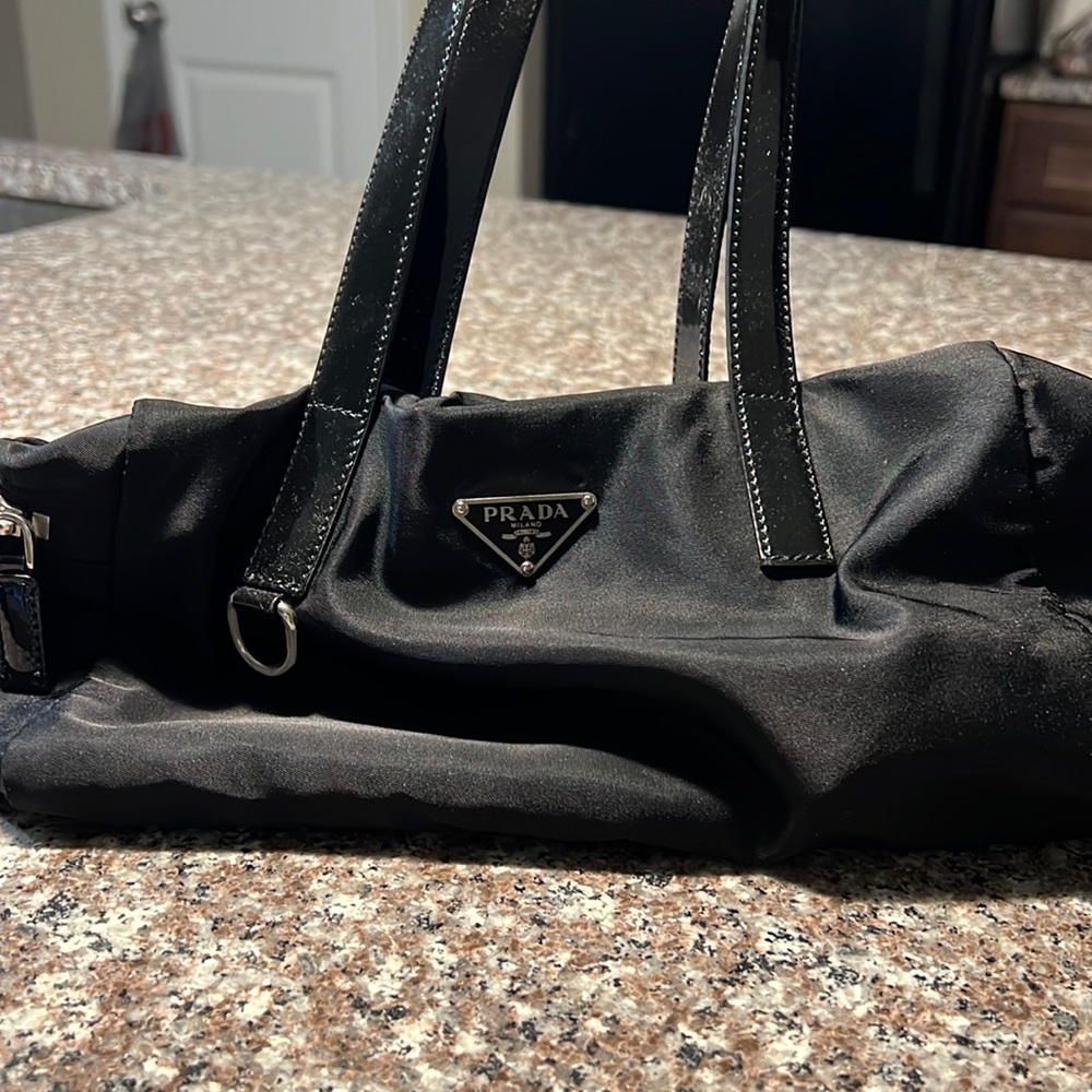 It’s a Prada hand bag in great condition I have used it twice